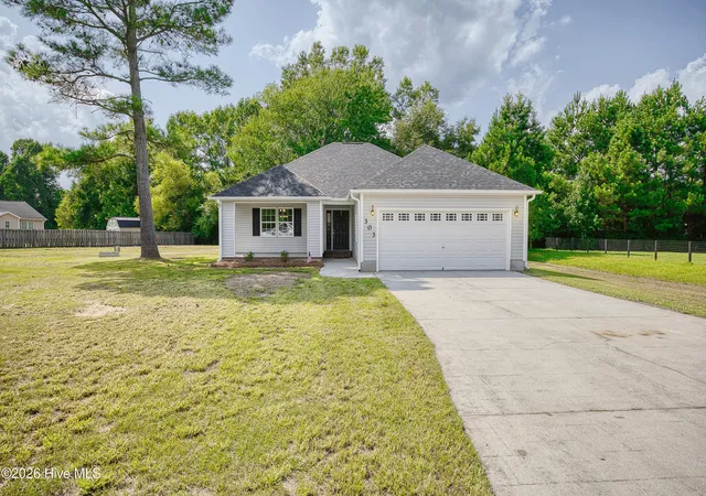 Photo 2 of Single family home for sale at 303 Big Tree Ln, Chinquapin, NC 28521 | MLS# 100597266 | Listing updated on 2026-08-19