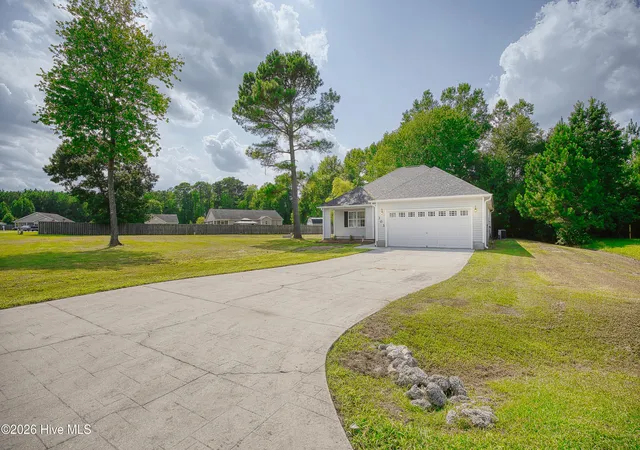 Photo 3 of Single family home for sale at 303 Big Tree Ln, Chinquapin, NC 28521 | MLS# 100597266 | Listing updated on 2026-08-19