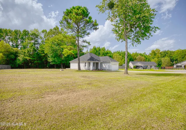 Photo 3 of Single family home for sale at 303 Big Tree Ln, Chinquapin, NC 28521 | MLS# 100597266 | Listing updated on 2026-08-19