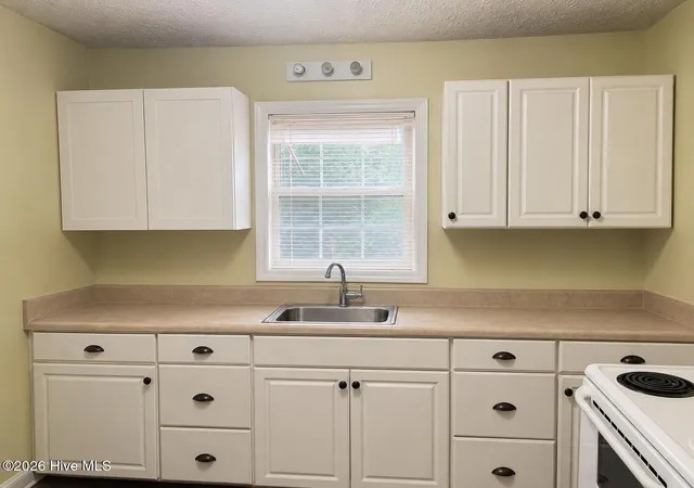 Photo 3 of Single family home for sale at 590 S Glover St, Southern Pines, NC 28387 | MLS# 100597361 | Listing updated on 2026-08-24