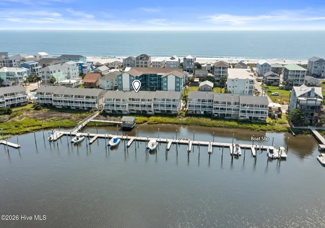 Photo 2 of Townhouse for sale at 1403 Canal Dr # 10, Carolina Beach, NC 28428 | MLS# 100598877 | Listing updated on 2026-09-14