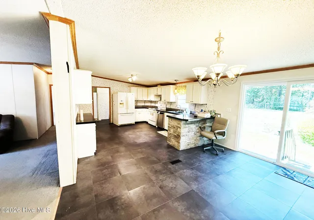 Photo 3 of Manufactured home for sale at 1001 Patch Dr, Newport, NC 28570 | MLS# 100599234 | Listing updated on 2026-09-30