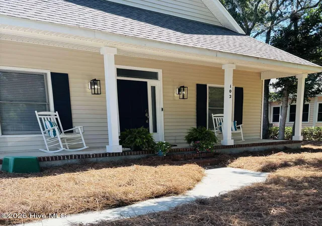 Photo 1 of Townhouse for sale at 102 Oceangreens Ln, Oak Island, NC 28465 | MLS# 100593237 | Listing updated on 2026-08-31