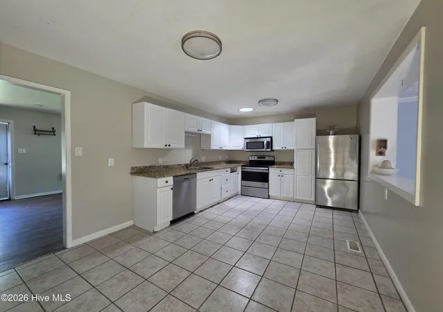 Photo 3 of Single family home for sale at 708 Barn St, Jacksonville, NC 28540 | MLS# 100598602 | Listing updated on 2026-10-03