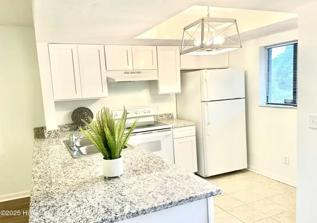 Photo 2 of Condo for sale at 4451 Holly Tree Rd, Wilmington, NC 28412 | MLS# 100599001 | Listing updated on 2026-08-26