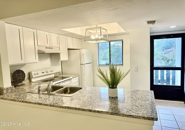 Photo 4 of Condo for sale at 4451 Holly Tree Rd, Wilmington, NC 28412 | MLS# 100599001 | Listing updated on 2026-08-26