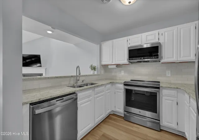 Photo 4 of Townhouse for sale at 6211 Wrightsville Ave #129, Wilmington, NC 28403 | MLS# 100594016 | Listing updated on 2026-08-27
