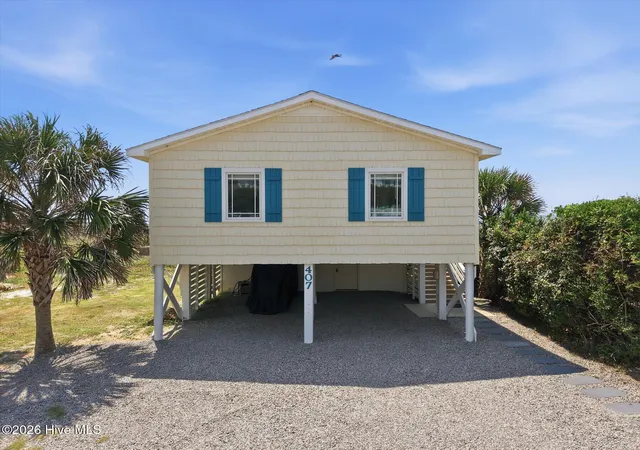 Photo 1 of Single family home for sale at 407 Ocean Dr, Oak Island, NC 28465 | MLS# 100598777 | Listing updated on 2026-08-27