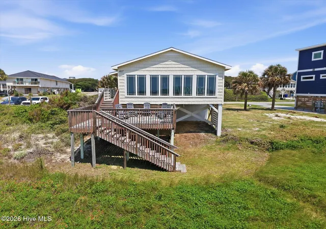 Photo 2 of Single family home for sale at 407 Ocean Dr, Oak Island, NC 28465 | MLS# 100598777 | Listing updated on 2026-08-27