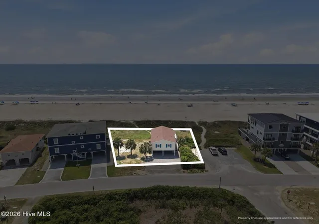 Photo 3 of Single family home for sale at 407 Ocean Dr, Oak Island, NC 28465 | MLS# 100598777 | Listing updated on 2026-09-20