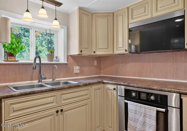 Photo 4 of Manufactured home for sale at 405 Sand Ridge Rd, New Bern, NC 28560 | MLS# 100599472 | Listing updated on 2026-09-10