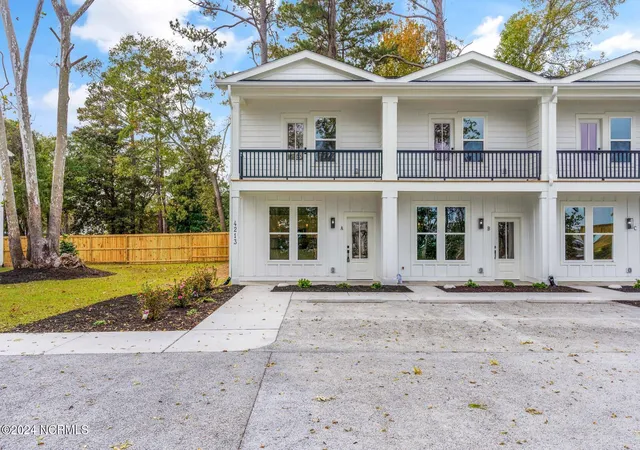 Photo 1 of Townhouse for sale at 4213 Spirea Dr #A, Wilmington, NC 28403 | MLS# 100596326 | Listing updated on 2026-08-19
