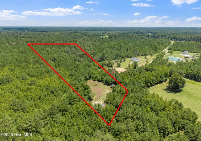 Photo 1 of Land for sale at 5690 Caroline Jones Rd Ne, Winnabow, NC 28479 | MLS# 100596399 | Listing updated on 2026-08-23