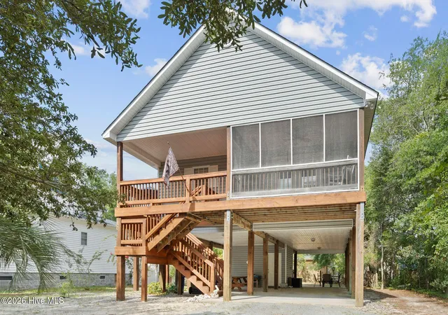 Photo 1 of Single family home for sale at 143 Ne 4th St, Oak Island, NC 28465 | MLS# 100599454 | Listing updated on 2026-10-08