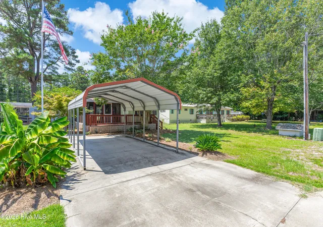 Photo 2 of Manufactured home for sale at 1229 Sea Cvs Pl Sw, Supply, NC 28462 | MLS# 100590023 | Listing updated on 2026-09-03