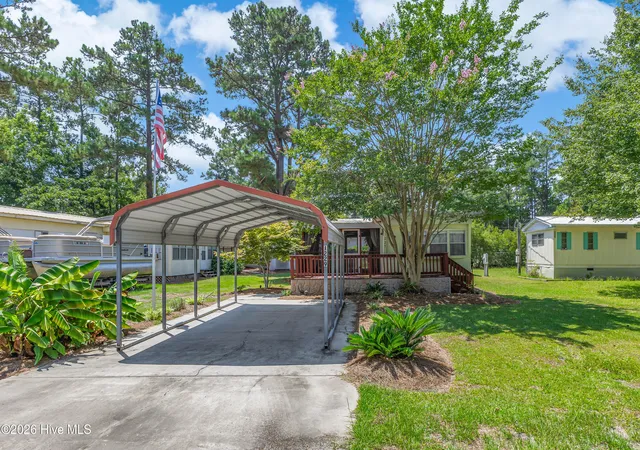 Photo 3 of Manufactured home for sale at 1229 Sea Cvs Pl Sw, Supply, NC 28462 | MLS# 100590023 | Listing updated on 2026-09-03