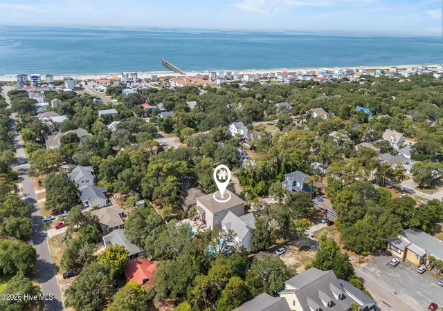 Photo 3 of Single family home for sale at 310 Trott St, Oak Island, NC 28465 | MLS# 100592064 | Listing updated on 2026-08-26
