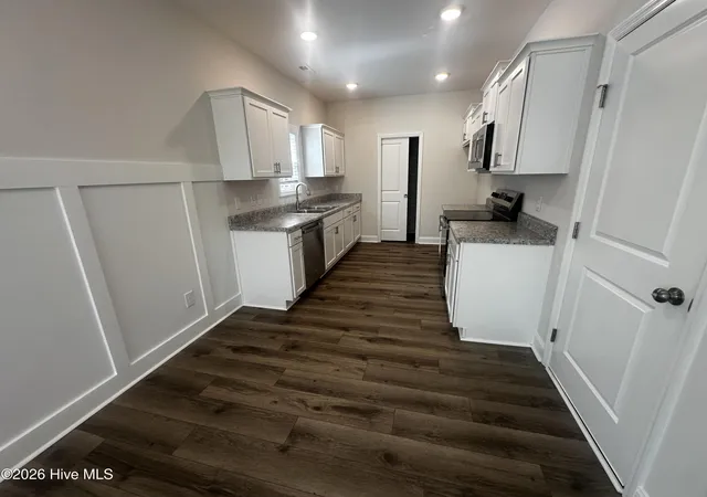 Photo 2 of Single family home for sale at 214 Hayden Pl, Jacksonville, NC 28540 | MLS# 100592323 | Listing updated on 2026-10-08