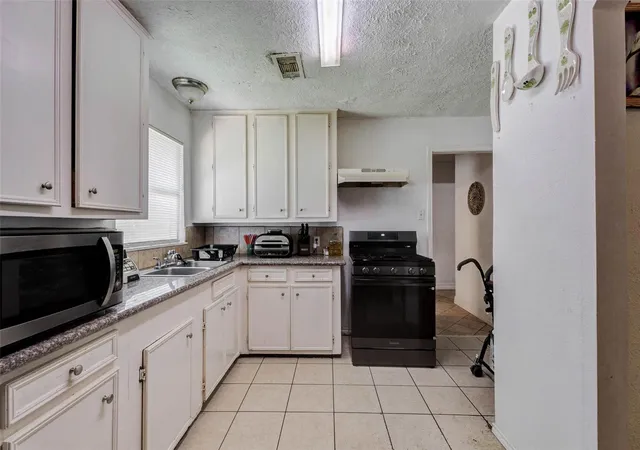5th image of 1607 Beusch Dr, Pasadena, TX 77502 | MLS# 2307776