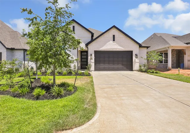 Photo 2 of Single family home for sale at 407 Flt Rock Trl, Conroe, TX 77304 | MLS# 13823772 | Listing updated on 2026-09-13