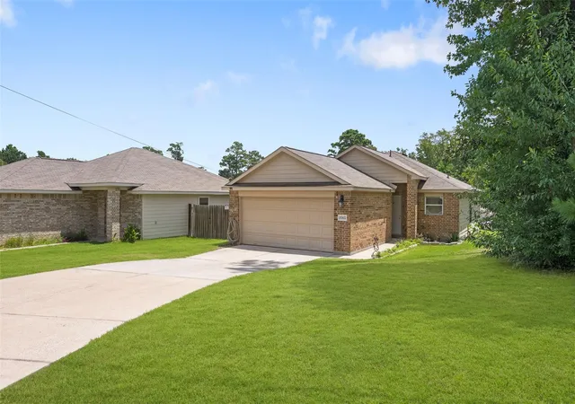 Photo 2 of Single family home for sale at 15302 Kickapoo Trl, Willis, TX 77378 | MLS# 76222501 | Listing updated on 2026-08-12