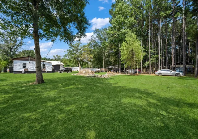 50th image of 669 County Road 3408, Cleveland, TX 77327 | MLS# 55361699