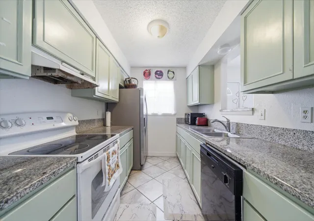 Photo 4 of Townhouse for sale at 2465 Briarwest Blvd, Houston, TX 77077 | MLS# 10844447 | Listing updated on 2026-09-20