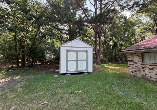 5th image of 606 Pine Tree Rd, Huntsville, TX 77320 | MLS# 95219271
