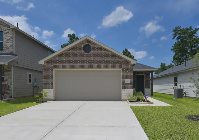 Photo 2 of Single family home for sale at 1887 Brushy Cedar Dr, Conroe, TX 77301 | MLS# 486089 | Listing updated on 2026-09-14