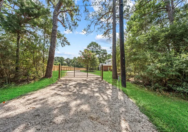 Photo 2 of Single family home for sale at 14989 Old Humble Pipeline Rd, Conroe, TX 77302 | MLS# 88234179 | Listing updated on 2026-08-17