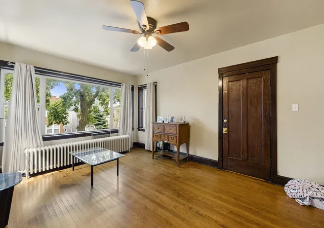 Photo 2 of Multi family home for sale at 5121 W Henderson Ave, Chicago, IL 60641 | MLS# 12536937 | Listing updated on 2026-08-25