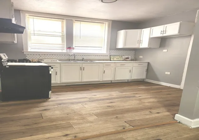 Photo 4 of Multi family home for sale at 8017 S Maryland Ave, Chicago, IL 60619 | MLS# 12664564 | Listing updated on 2026-09-01