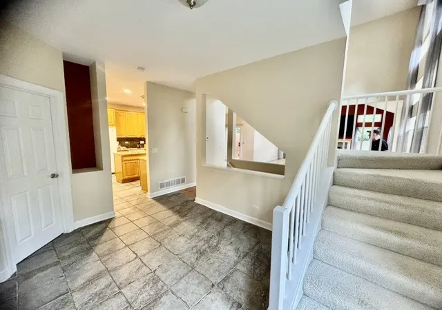 Photo 2 of Townhouse for sale at 1488 White Oak Ln, Woodstock, IL 60098 | MLS# 12678217 | Listing updated on 2026-09-05