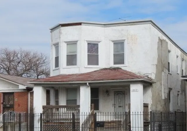 Photo 3 of Multi family home for sale at 1517 N Laramie Ave, Chicago, IL 60651 | MLS# 12710022 | Listing updated on 2026-09-08