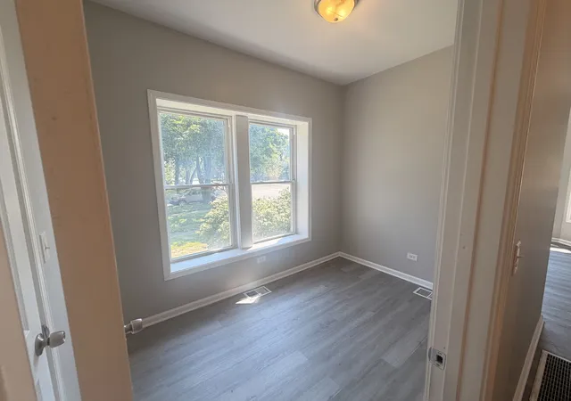 Photo 4 of Multi family home for sale at 8755 S Cottage Grv Ave, Chicago, IL 60619 | MLS# 12710810 | Listing updated on 2026-08-21
