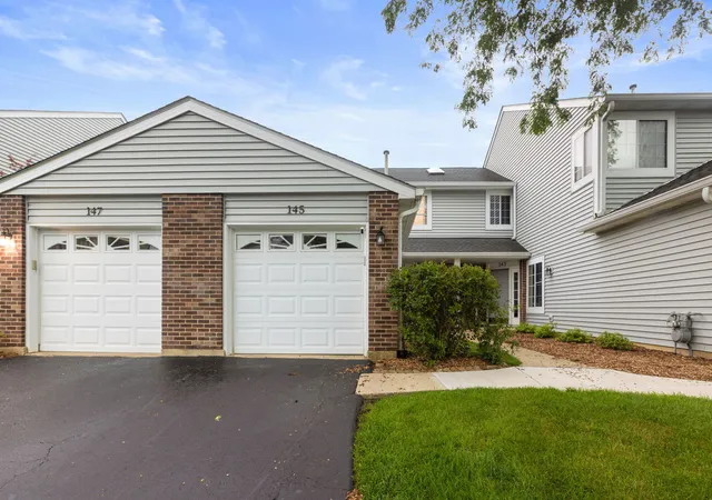 Photo 1 of Townhouse for sale at 145 Winchester Dr, Streamwood, IL 60107 | MLS# 12723454 | Listing updated on 2026-09-01
