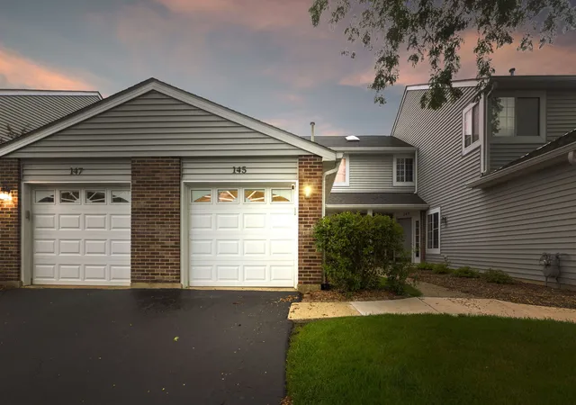 Photo 2 of Townhouse for sale at 145 Winchester Dr, Streamwood, IL 60107 | MLS# 12723454 | Listing updated on 2026-09-01