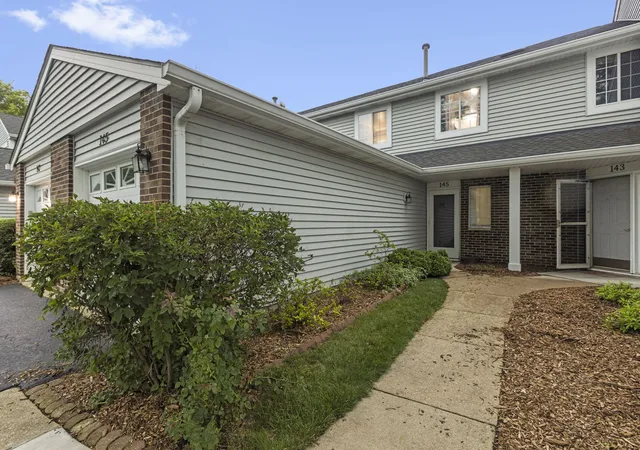 Photo 3 of Townhouse for sale at 145 Winchester Dr, Streamwood, IL 60107 | MLS# 12723454 | Listing updated on 2026-09-01