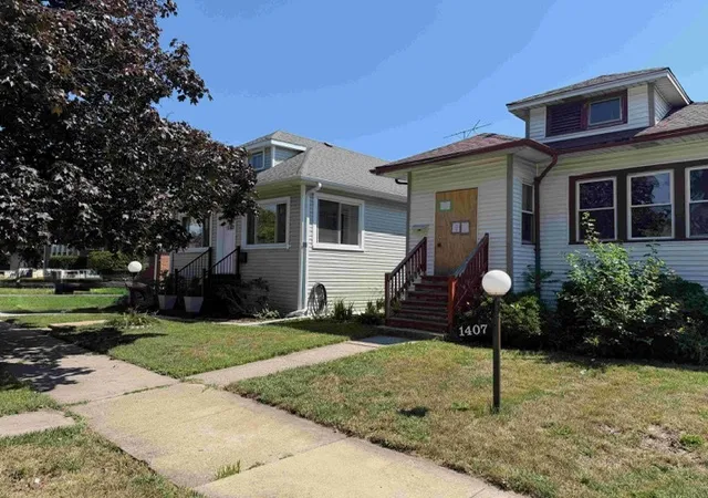 Photo 2 of Single family home for sale at 1407 S 16th Avenue, Maywood, IL 60153 | MLS# 12724039 | Listing updated on 2026-08-25