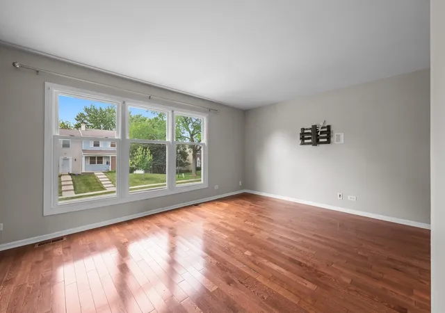 Photo 3 of Townhouse for sale at 1015 Denham Pl, Schaumburg, IL 60194 | MLS# 12731085 | Listing updated on 2026-08-19