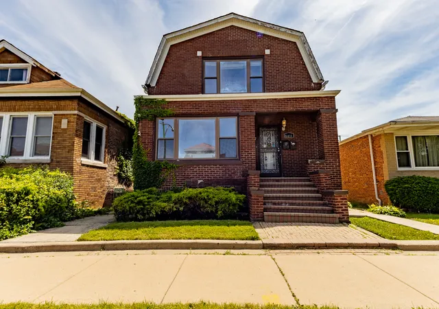 Photo 1 of Multi family home for sale at 8411 S Elizabeth St, Chicago, IL 60620 | MLS# 12732947 | Listing updated on 2026-08-25