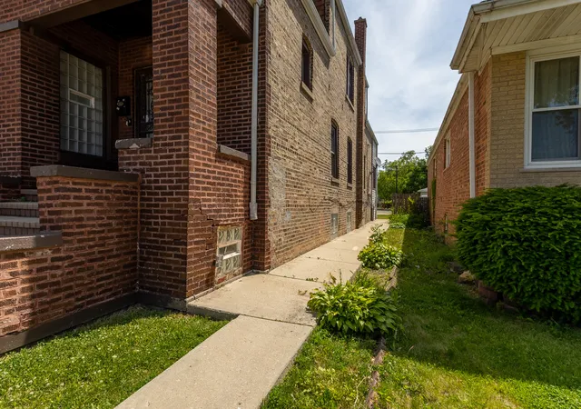 Photo 2 of Multi family home for sale at 8411 S Elizabeth St, Chicago, IL 60620 | MLS# 12732947 | Listing updated on 2026-08-25