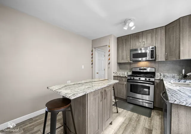 Photo 2 of Sale Pending at 6357 W Addison St #1FSW, Chicago, IL 60634 | MLS# 12733028 | Listing updated on 2026-09-07