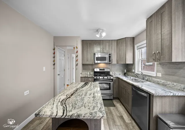 Photo 3 of Sale Pending at 6357 W Addison St #1FSW, Chicago, IL 60634 | MLS# 12733028 | Listing updated on 2026-09-07