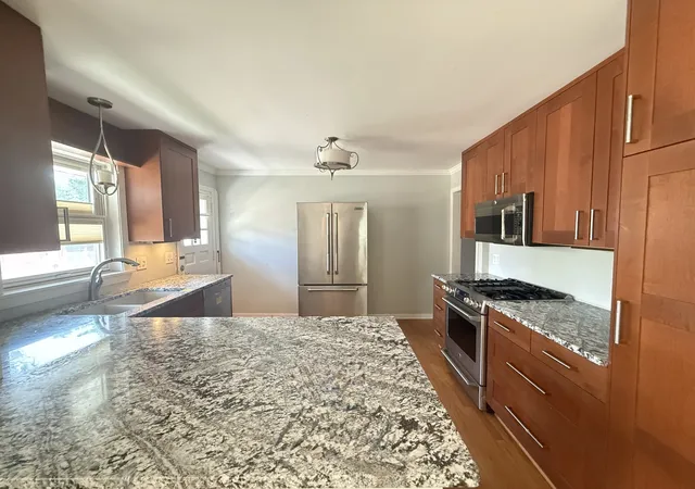 Photo 3 of Single family home for sale at 1811 N Thatcher Ave, Elmwood Park, IL 60707 | MLS# 12733437 | Listing updated on 2026-09-01