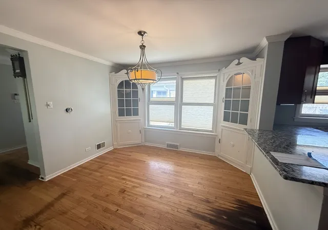 Photo 3 of Single family home for sale at 1811 N Thatcher Ave, Elmwood Park, IL 60707 | MLS# 12733437 | Listing updated on 2026-09-01