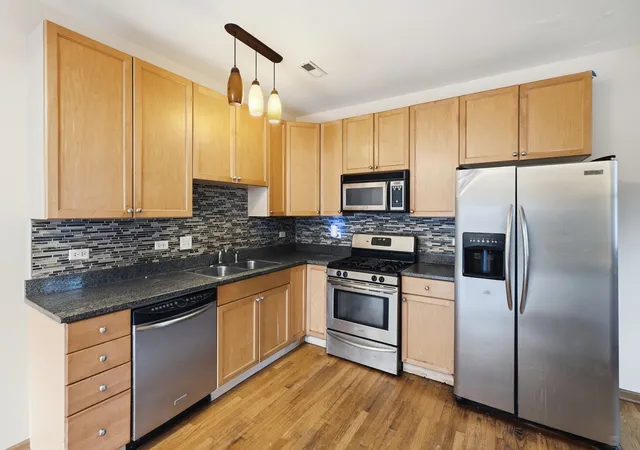 Photo 3 of Condo for sale at 1469 E 69th Street #2, Chicago, IL 60637 | MLS# 12734500 | Listing updated on 2026-08-22