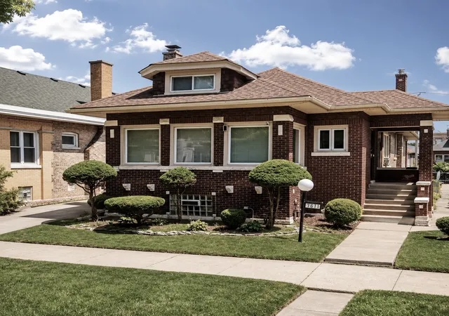 Single family home for sale at 7611 S Ridgeland Ave, Chicago, IL 60649 | MLS# 12735773