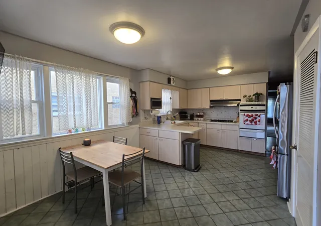 Photo 3 of Multi family home for sale at 6134 W Leland Ave, Chicago, IL 60630 | MLS# 12736664 | Listing updated on 2026-08-26