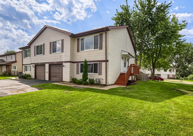 Photo 1 of Multi family home for sale at 2165 Wildwood Ct, Hanover Park, IL 60133 | MLS# 12738422 | Listing updated on 2026-08-28
